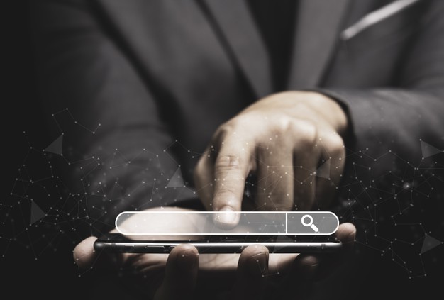 businessman-touching-smartphone-use-searching_50039-2051
